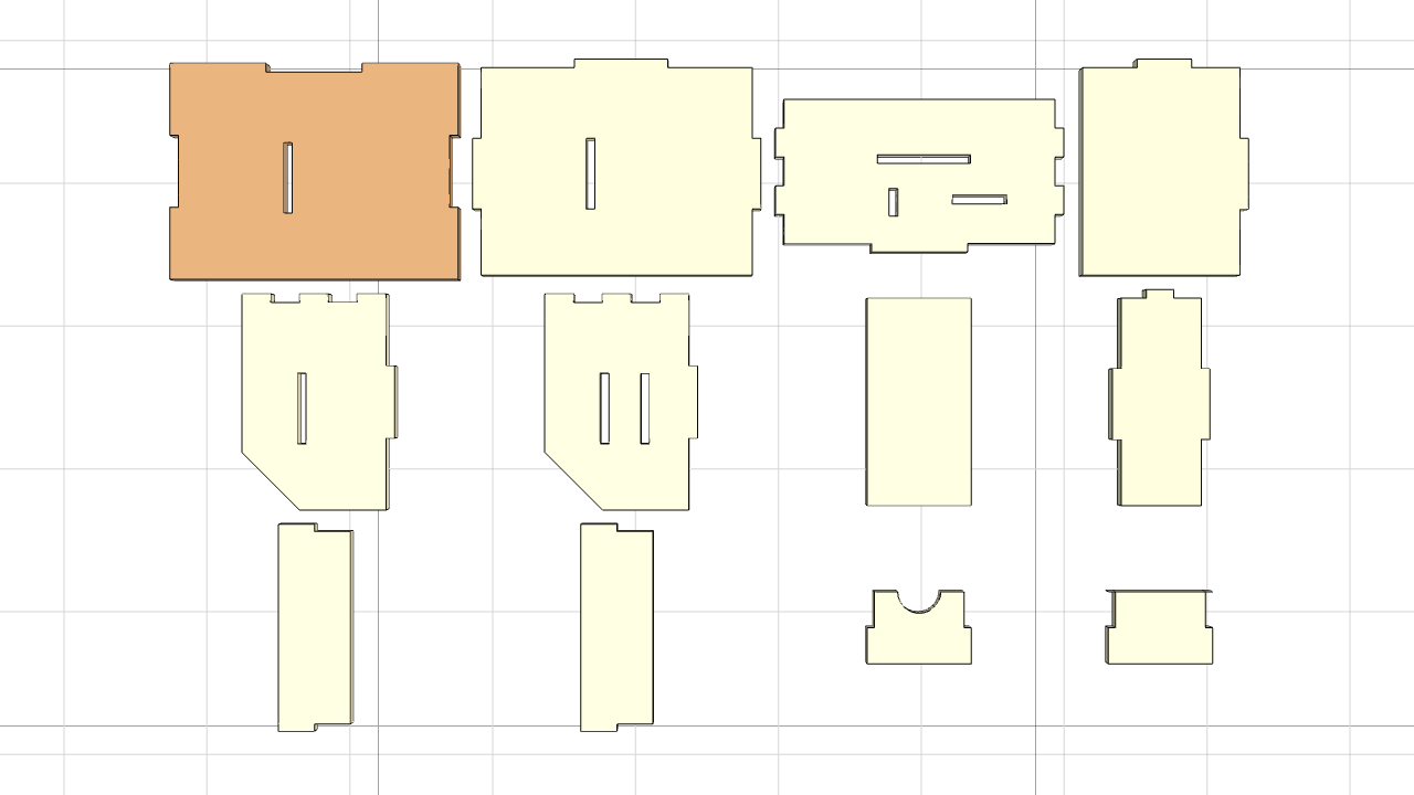 Flatpack layout view: every panel of the example box laid flat on the machine bed, showing finger joints, slots and handles at a glance